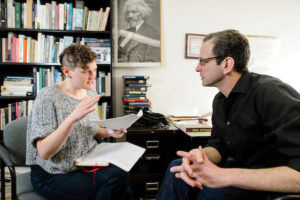 Russ Castronovo, professor of english, meets with a graduate student in the his office in Helen C. White Hall at the University of Wisconsin-Madison on Feb. 9, 2016. Castronovo is one of twelve 2016 Distinguished Teaching Award recipients. (Photo by Bryce Richter / UW-Madison)