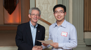JJ Wang receiving his 2013 Hilldale Undergraduate Research Fellowship Award
