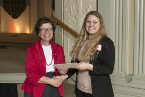 Featured Scholar Rachel Dvorak at the 2014 Chancellor's Undergraduate Award Ceremony with Chancellor Rebecca Blank.